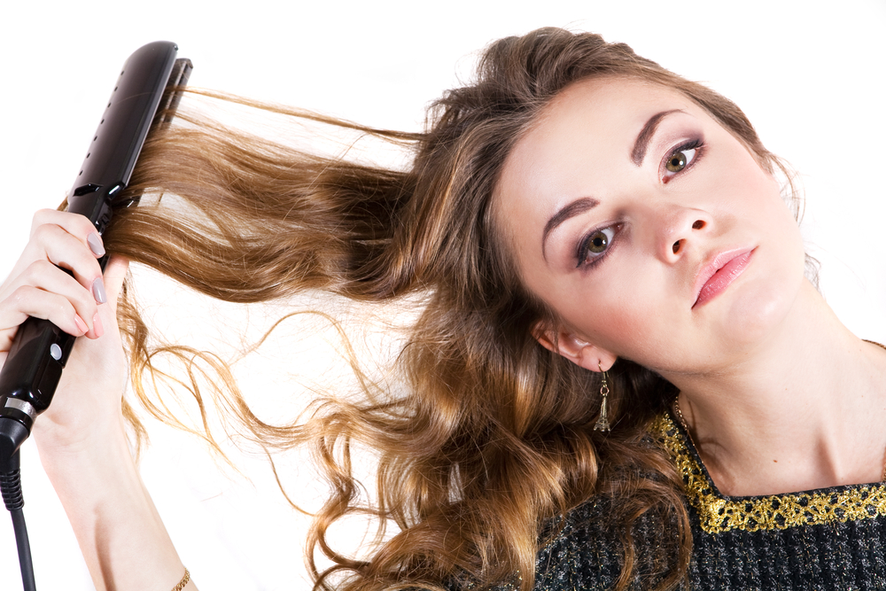 8 Flat Iron Mistakes That Are Damaging Your Hair